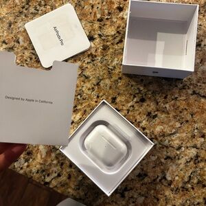 Apple AirPods Pro with White Charging Case